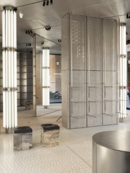 Round steel displays, tube cutout shelving, rails, racks and displays made from repurposed car parts developed and produced by ErtlundZull with Thorben Groeble and B+ for the Trussardi Flagship store in Milan, Italy. ErtlundZull