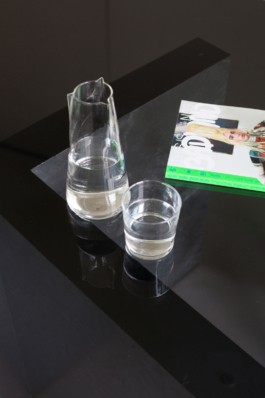 A round table with smoke glass top, a curved galvanized steel staircase and crashed ceiling light for Bus Group Studio, Berlin 2019. Design by ErtlundZull and Atelier Fanelsa. Photo by ErtlundZull and Atelier Fanelsa. ErtlundZull