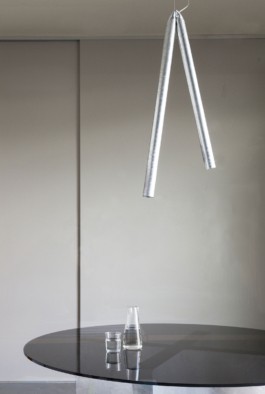 A round table with smoke glass top, a curved galvanized steel staircase and crashed ceiling light for Bus Group Studio, Berlin 2019. Design by ErtlundZull and Atelier Fanelsa. Photo by ErtlundZull and Atelier Fanelsa. ErtlundZull