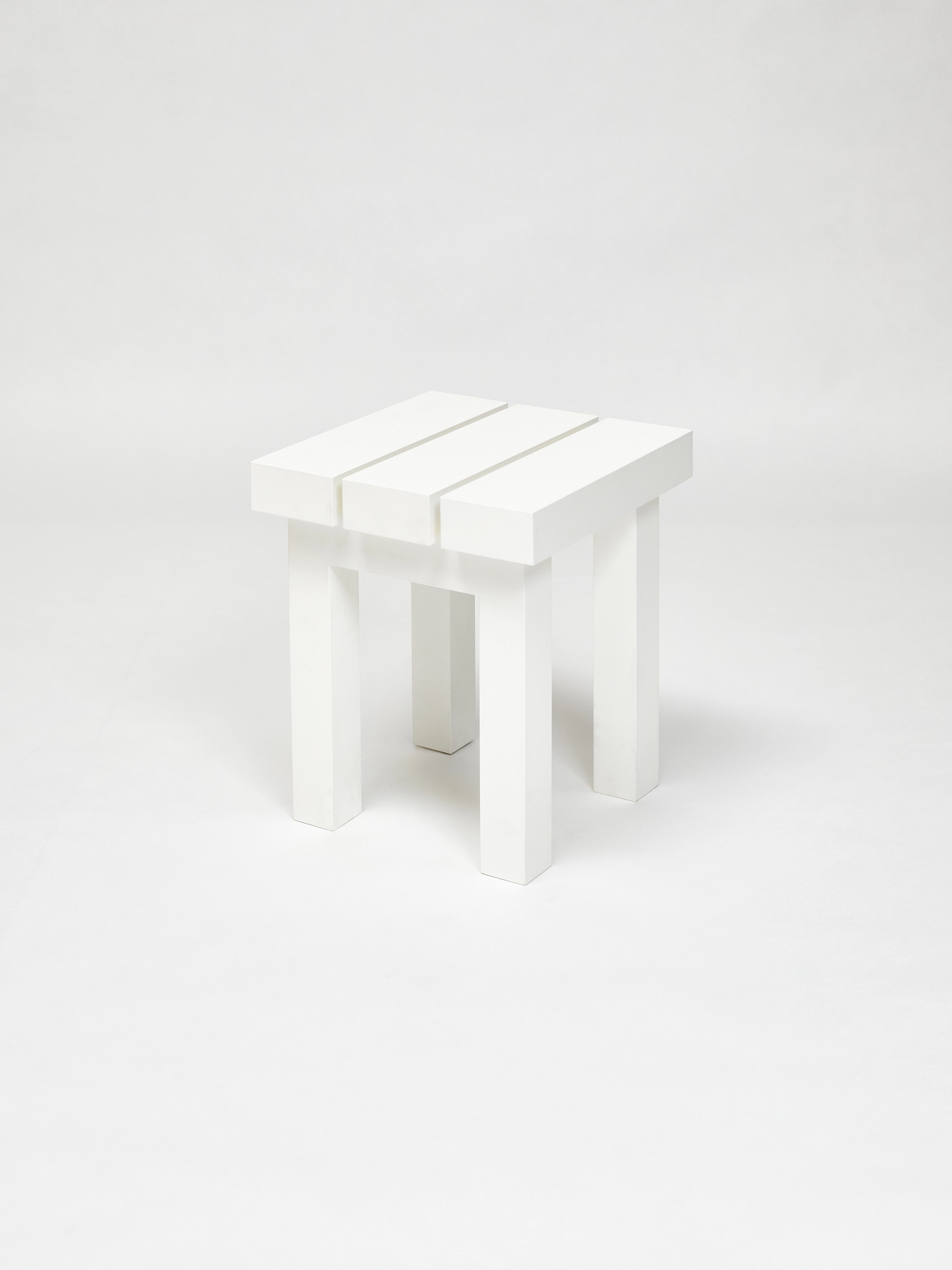 White stool from the aluminium furniture series Pretending It's Wood. Designed by ErtlundZull. Photographed by Robert Hamcher. ErtlundZull