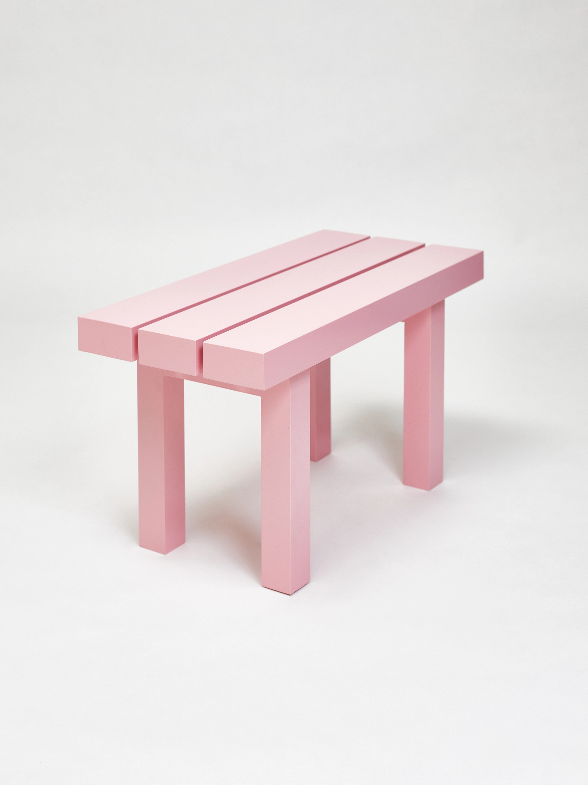 Small light pink bench from the aluminium furniture series Pretending It's Wood. Designed by ErtlundZull. Photographed by Robert Hamcher. ErtlundZull