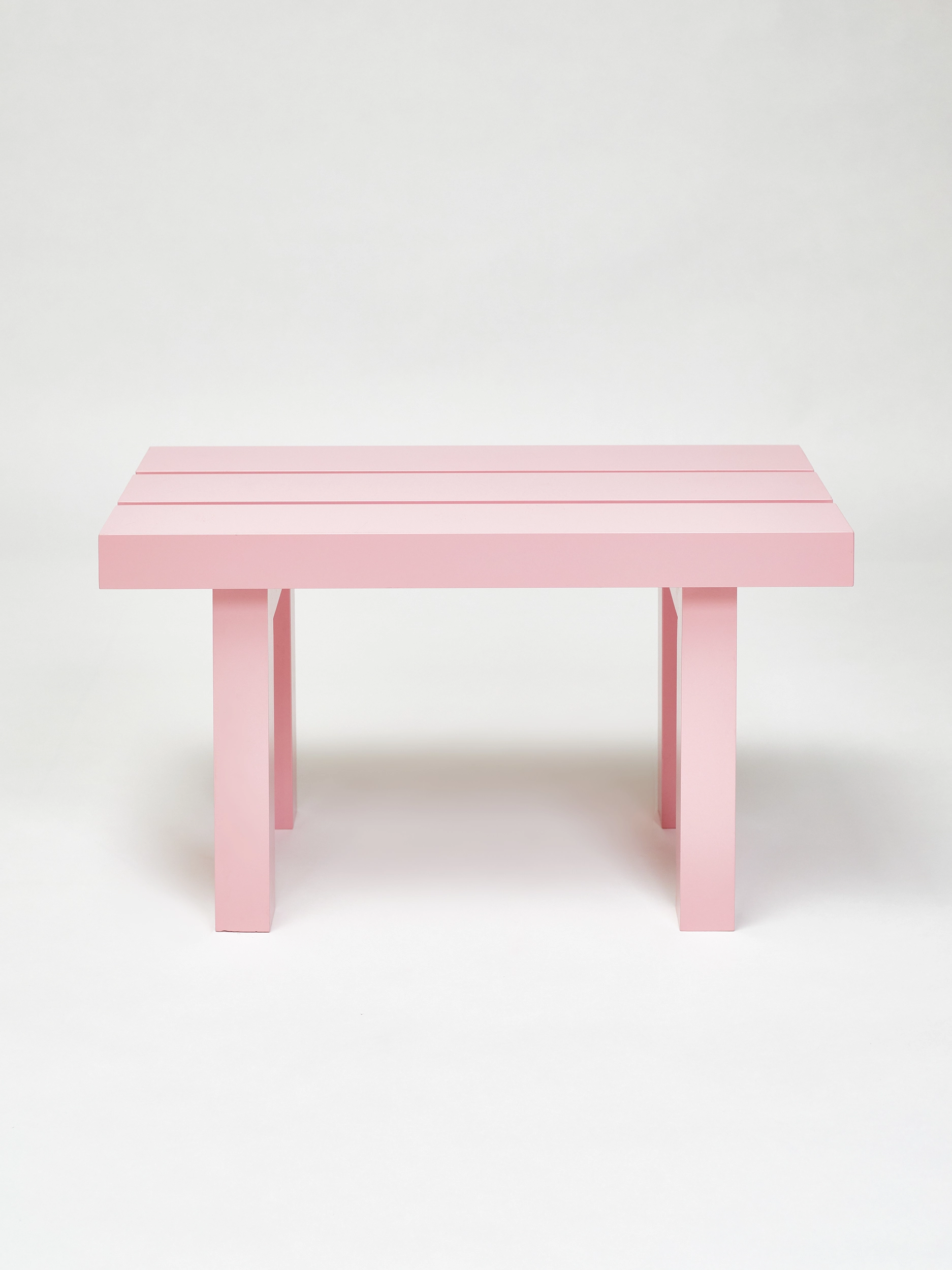 Small light pink bench from the aluminium furniture series Pretending It's Wood. Designed by ErtlundZull. Photographed by Robert Hamcher. ErtlundZull