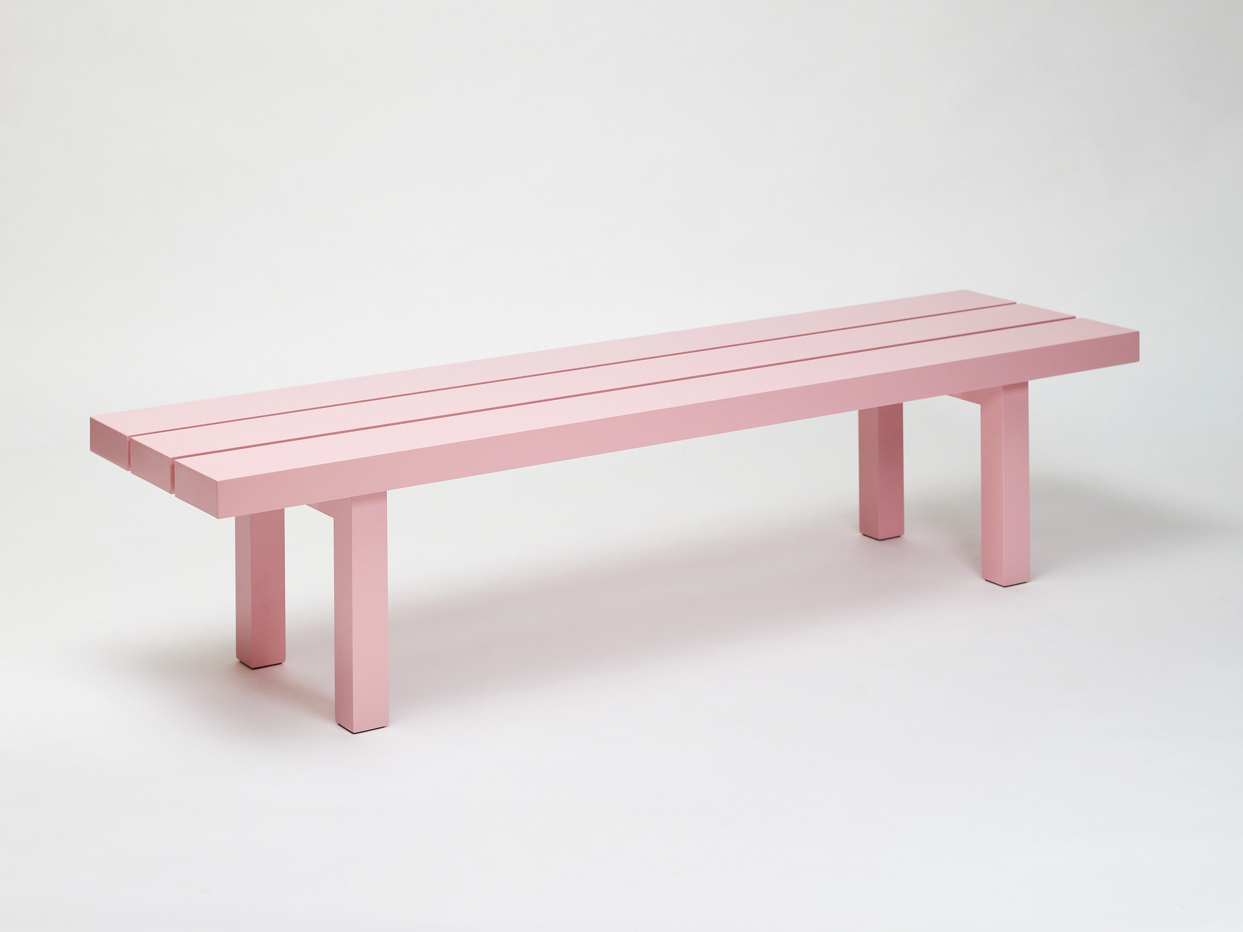 Big light pink bench without backrest from the aluminium furniture series Pretending It's Wood. Designed by ErtlundZull. Photographed by Robert Hamcher. ErtlundZull